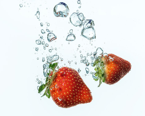 Healthy fresh fruit salad and water bottle