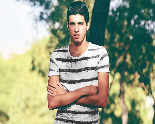 Portrait of Indian man standing confident